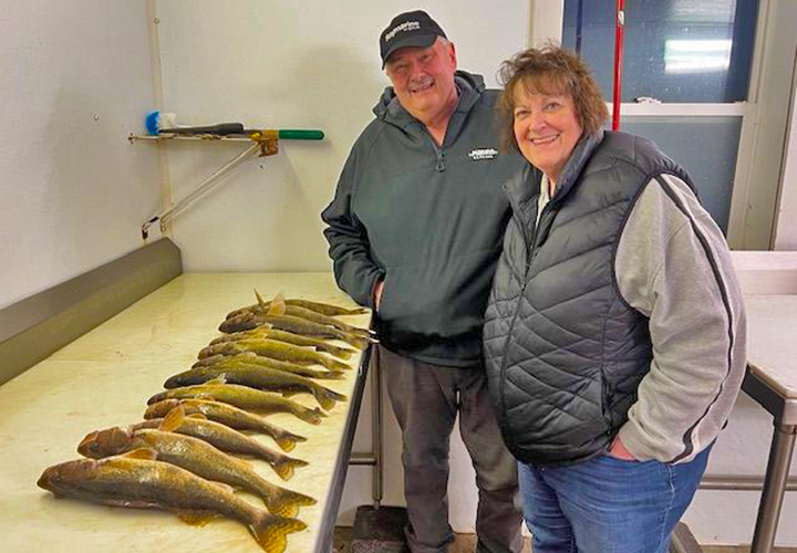 image of ice anglers with walleye limits from Lake of the Woods